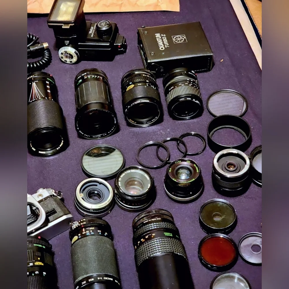 Two Canon cameras and lenses